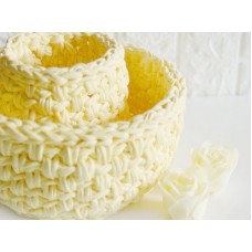 Two yellow crochet round baskets